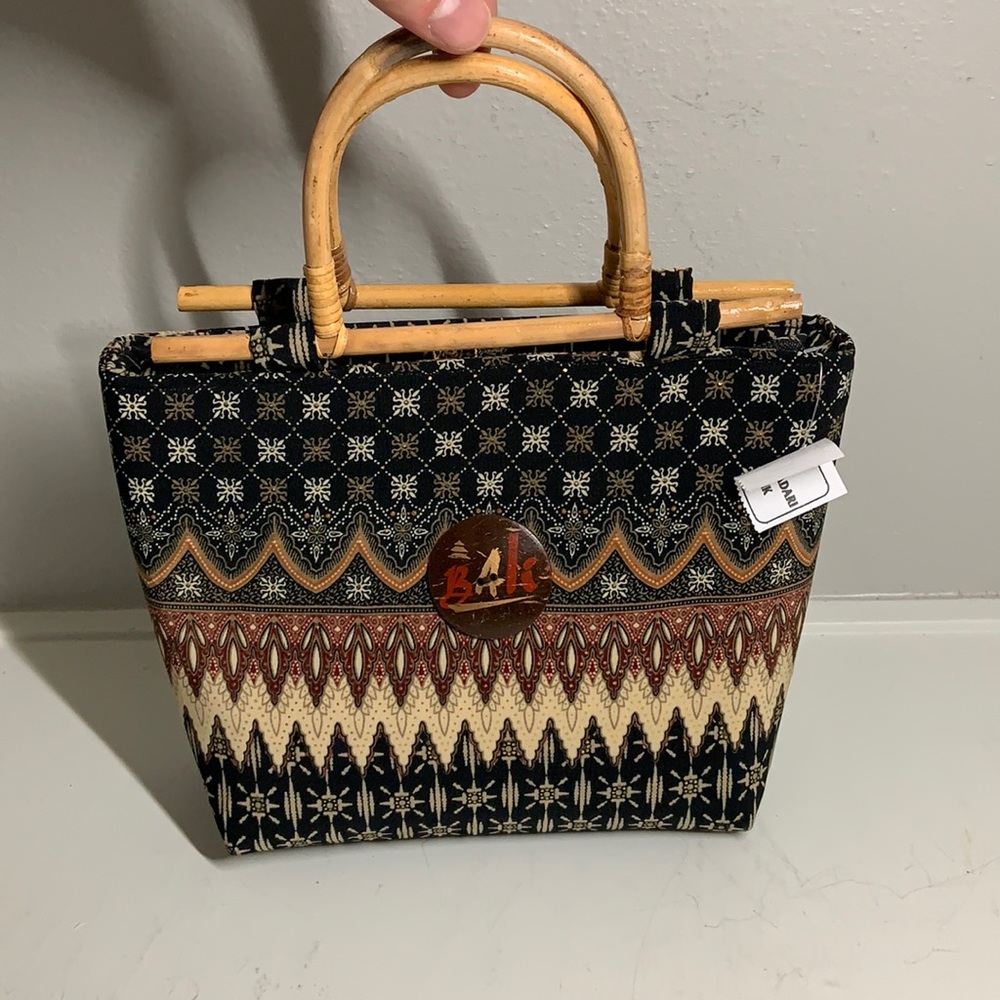 Polyester handbag , wooden handles